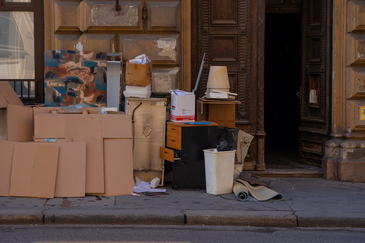 Bulky Waste on Budapest Streets - Discarded furniture and appliances clutter sidewalks